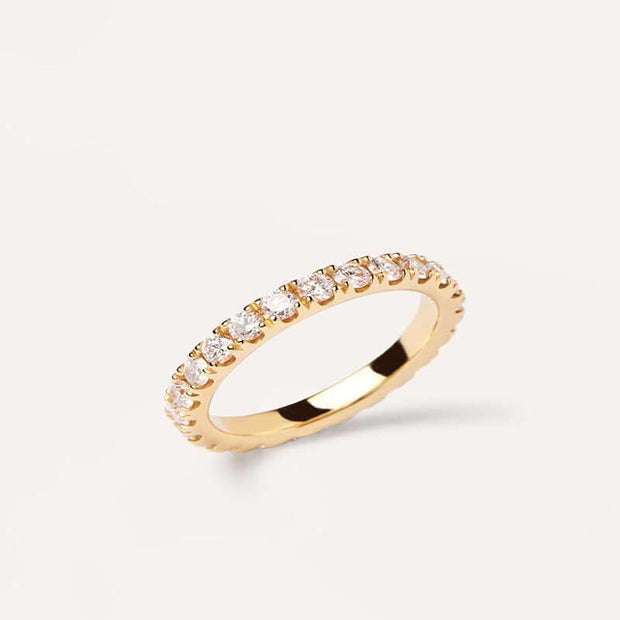 A luxury yellow gold Eternity Ring, radiating trend-setting beauty with its stunning white gemstones.
