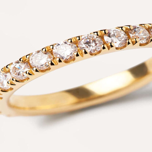 A luxury yellow gold Eternity Ring adorned with round Zirconia, exuding trend-setting beauty.