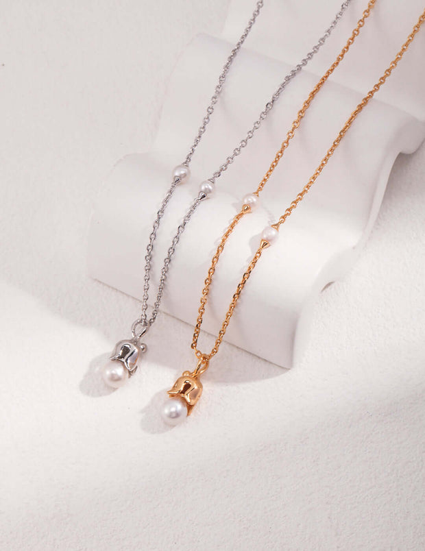 Three Natural Pearl Necklaces with gold and silver.