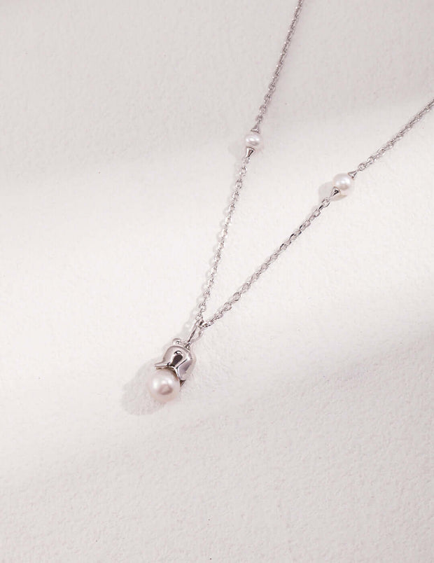 A sterling silver Natural Pearl Necklace.