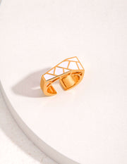 The Modernist Contrast Ring has a unique geometric pattern.