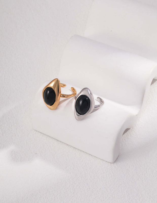 An Artisan Carved Agate ring featuring a stunning onyx stone set in 18K gold vermeil.