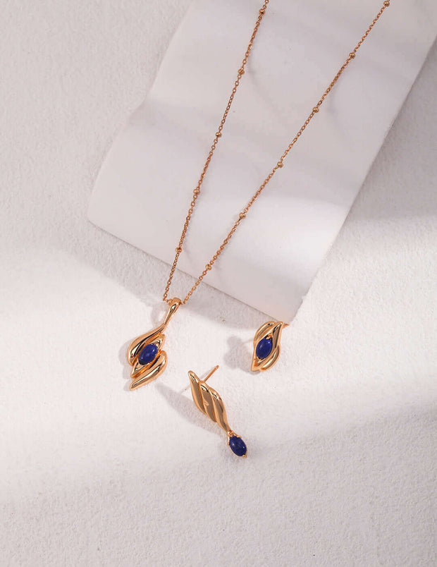 Lazurite Antiquity Earrings," a classy and edgy 18K Gold Vermeil necklace and earring set with blue stones.